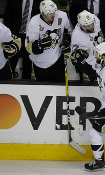 The Latest: Letang, Couture score, Penguins lead Sharks 2-1